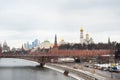 Moscow, Russia - DECEMBER 28, 2020: View of the Kremlin in the center of Moscow from Zaryadye Park. Panorama of the winter snow