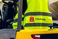 MOSCOW, RUSSIA - DECEMBER 16, 2020 YOLKA WMS badge on yellow signal vest close up view.