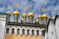 Gilded Cupolas of the Terem Palace Churches Against Beautiful Sky