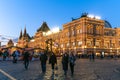 Moscow, Russia - Feb 21. 2020. People on the Red Square in front of Gum shop on Christmas evening Royalty Free Stock Photo