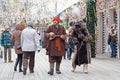 Buffoon with balalaika and bear at Russian national festival `Shrove` on Tverskaya Square in Moscow