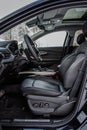 MOSCOW, RUSSIA - FEBRUARY 23, 2021 CHERYEXEED TXL SUV car dark interior close up view. Dashboard, driver seat and steering wheel c Royalty Free Stock Photo