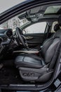 MOSCOW, RUSSIA - FEBRUARY 23, 2021 CHERYEXEED TXL SUV car dark interior close up view. Dashboard, driver seat and steering wheel c Royalty Free Stock Photo