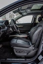 MOSCOW, RUSSIA - FEBRUARY 23, 2021 CHERYEXEED TXL SUV car dark interior close up view. Dashboard, driver seat and steering wheel c Royalty Free Stock Photo