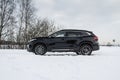 MOSCOW, RUSSIA - FEBRUARY 23, 2021 CHERYEXEED TXL SUV car front side close up view. Royalty Free Stock Photo