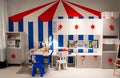 Moscow, Russia, February 2021: Children`s IKEA circus theme. Showroom in the store: storage cabinets, tables, chairs and toys