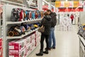 Moscow, Russia - February 02. 2016. Customers choose a vacuum cleaner in Eldorado, large chain stores selling