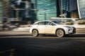 Front side view of white Lexus RX car fourth generation AL20 in motion on speedway road in city Royalty Free Stock Photo