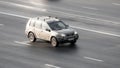 Gray Nissan X-Trail first generation T30 car moving on the street. Compliance with speed limits on road concept