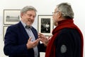 Head of the Yabloko party Grigory Yavlinsky and photojournalist Yuri Rost at a photo exhibition at the Moscow Central Exhibition H