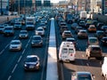 Moscow, Russia - February 8, 2020: Heavy traffic on the third traffic ring on a sunny Saturday afternoon. In extreme row an