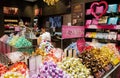 Moscow, Russia, February 2021: Inside the Lindt chocolate brand store. Piles of candy, sweets, and shoppers inside