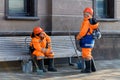 Moscow, Russia, February 2020. A man and a woman street cleaners rest and talk