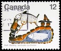 Postage stamp printed in Canada shows Fishing with spear, Native Amerindians of Canada 1977 serie, circa 1977 Royalty Free Stock Photo