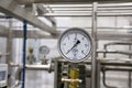 MOSCOW, RUSSIA. 07 February 2018: Pressure gauge manometer, valves and pipes made of white metal Royalty Free Stock Photo