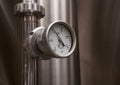 MOSCOW, RUSSIA. 07 February 2018: Pressure gauge manometer, valves and pipes made of white metal Royalty Free Stock Photo