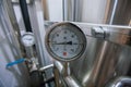 MOSCOW, RUSSIA. 07 February 2018: Pressure gauge manometer, valves and pipes made of white metal Royalty Free Stock Photo