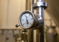 MOSCOW, RUSSIA. 07 February 2018: Pressure gauge manometer of white metal - brewing equipment. Royalty Free Stock Photo