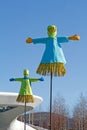 Russian Shrovetide dolls stand on sticks as art objects at Russian national festival `Shrove` in Zaryadye park in Moscow