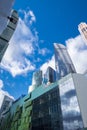 Skyscrapers modern architecture office building with clouds in blue sky, high tech style of Royalty Free Stock Photo