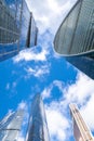 Skyscrapers modern architecture office building with clouds in blue sky, high tech style of Royalty Free Stock Photo