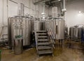 MOSCOW, RUSSIA. 07 February 2018: Staircase and Huge Tanks of white metal, which brewed beer