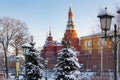 Moscow, Russia - February 01, 2018: Towers of Moscow Kremlin on the snow-covered trees background. Views from Alexandrovsky garden Royalty Free Stock Photo