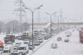 MOSCOW, RUSSIA - FEBRUARY, 2018: Traffic jam on the MKAD circle Moscow road during blizzard snowstorm. Royalty Free Stock Photo