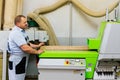 Moscow, Russia, 08.05.2018: Furniture factory. Shop for wood processing and furniture manufacturing. Workers make furniture cabine