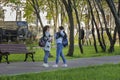 MOSCOW, RUSSIA - 2017-05-14: Girls having a lively talk in the Warriors-Winners Park in Lefortovo neighborhood.