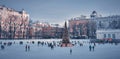 Ice-skating people with Christmas tree in Patriarch Ponds Royalty Free Stock Photo