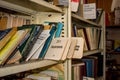 Moscow, Russia - January 2015: Abandoned factory library, old Soviet books on shelves