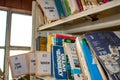 Moscow, Russia - January 2015: Abandoned factory library, old Soviet books on shelves