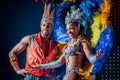 MOSCOW, RUSSIA- JANUARY 2017: Brazilian carnival show. Beautiful girl and boy bright colorful carnival costume on stage