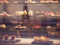 Moscow, Russia - January 17, 2020: Cakes on the shelves of a window of a street restaurant. Showcase of a pastry shop or cafe with