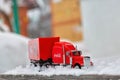 Moscow, Russia - January 02, 2019: Coca-Cola Christmas truck. A toy in red color rides in the real snow drifts. Outdoors, new year Royalty Free Stock Photo