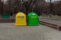 Moscow, Russia - January 7, 2020: Containers for separate garbage collection, waste sorting. Large yellow green tank for plastic
