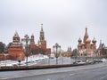 Moscow, Russia - January, 05, 2021: Intercession Cathedral or St. Basil`s Cathedral and the Spassky Tower of Moscow Kremlin at Re Royalty Free Stock Photo