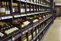 Moscow, Russia - January 6, 2020: Shelves with bottles of wine from different countries, vinotheque, alcohol production warehouse Royalty Free Stock Photo