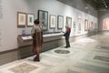 Visitors near stand in Pushkin Museum in Moscow Royalty Free Stock Photo