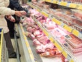 Moscow, Russia - January 23, 2016: woman in a shop buying meat