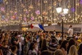 Interview on the street. Football fans of different countries celebrate the victory of the French team