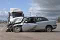 Accident involving a car and a truck. Broken car