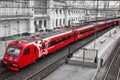 Moscow, Russia - July 2019. Aeroexpress. Railway, ancient architecture, top view from the bridge to the red train