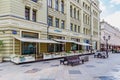 Moscow, Russia - July 28, 2019: Big glass showcases of restaurant on Nikolskaya street in Moscow at sunny summer morning. Popular