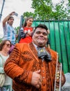 Moscow, Russia - July 7, 2018: Cheerful mexican street musician trumpeter mariachi portrait with trumpet in hand Royalty Free Stock Photo