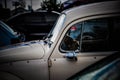 Moscow, Russia - July 06, 2019: Direct windshield of an old retro Volkswagen Beetle car. Side view, glass without bending