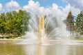 Moscow, Russia - July 22, 2019: Fountain Golden Spike in VDNH park in Moscow against blue sky at sunny summer day. Exhibition of