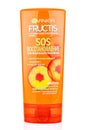 Moscow, Russia - July 22, 2020: GARNIER Fructis SOS recovery firming balm conditioner with amla oil for split ends and very