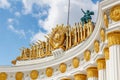 Moscow, Russia - July 22, 2019: Gilded coats of arms of soviet republics closeup on the facade of pavilion USSR on VDNH in